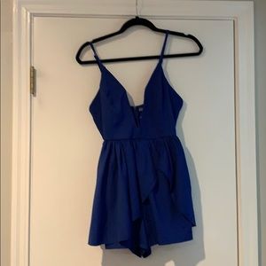 NWT. Deep V Royal Blue Romper